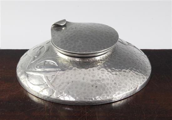 A Solkets English pewter inkwell, by Liberty & Co., in the manner of Archibald Knox, 5in.